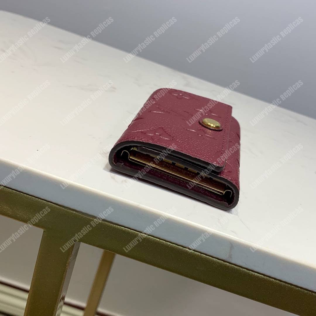 LV 6 KEY HOLDER Monogram Empreinte leather Aurore