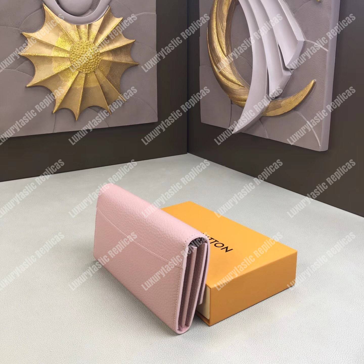 LV Capucines Wallet Magnolia