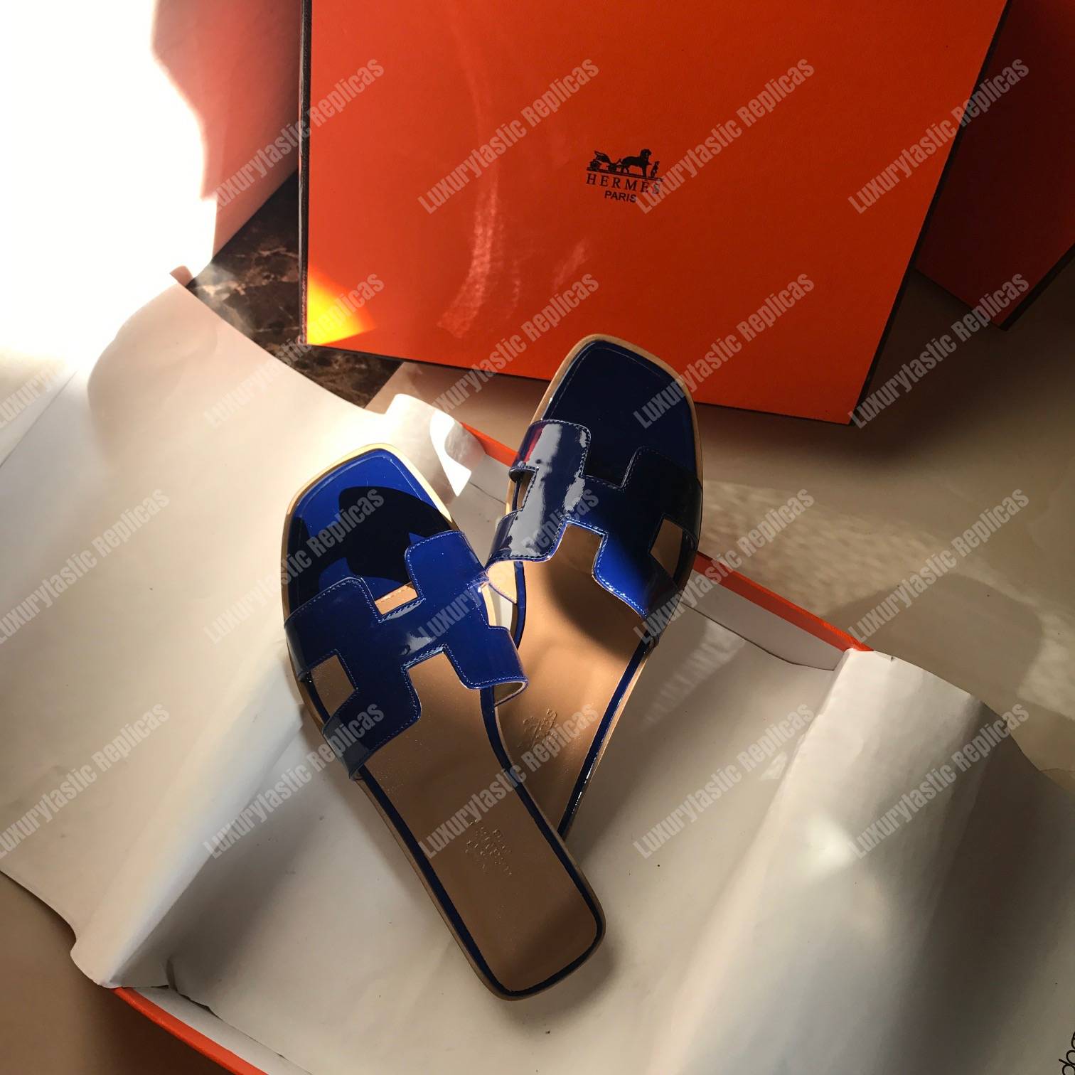 H**mes oran sandal patent leather blue