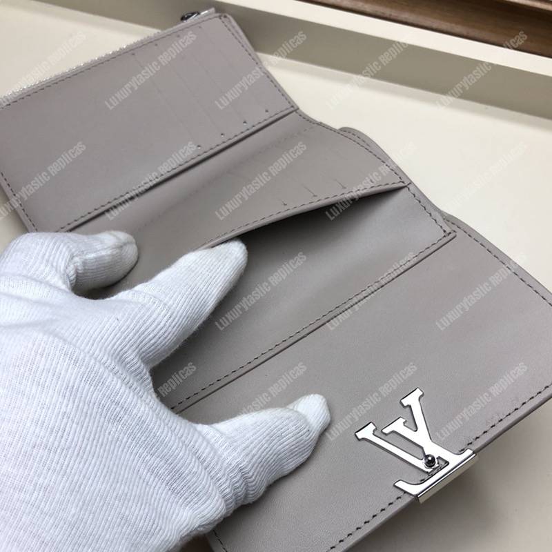 LV Capucines Compact Wallet Taurillon Magnolia Leather Monogram Flowers