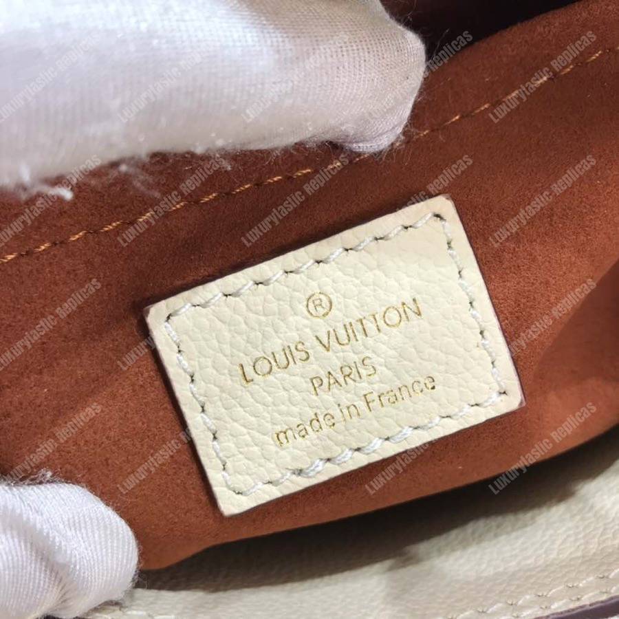 LV Montaigne BB Monogram Empreinte Leather Crème
