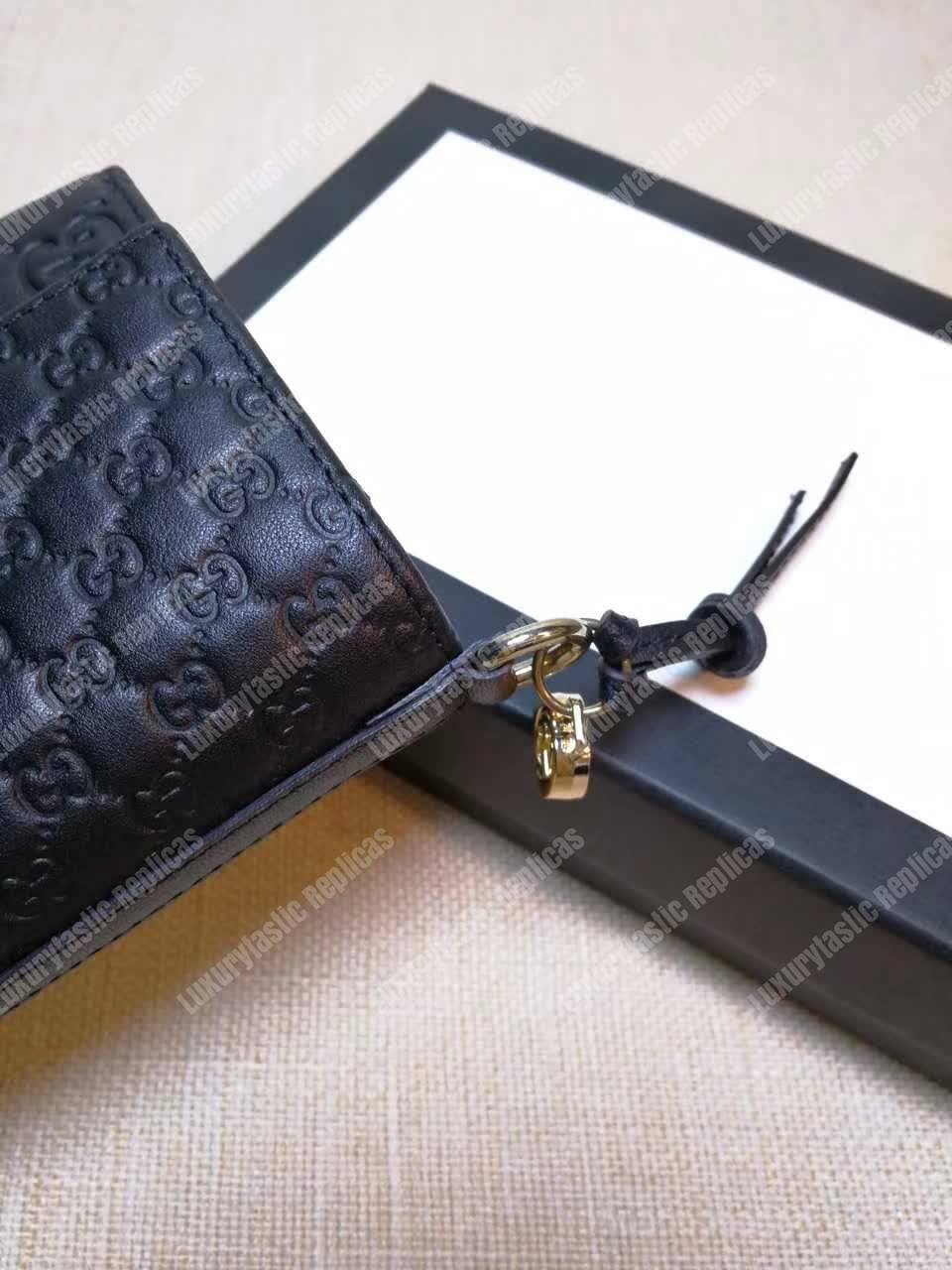 G*u*i gg bree G*u*issima leather flap wallet black