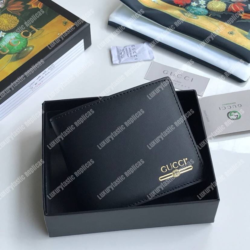 G*u*i leather wallet with G*u*i logo