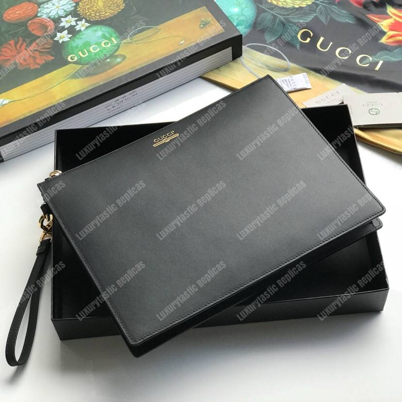 G*u*i leather pouch with G*u*i logo