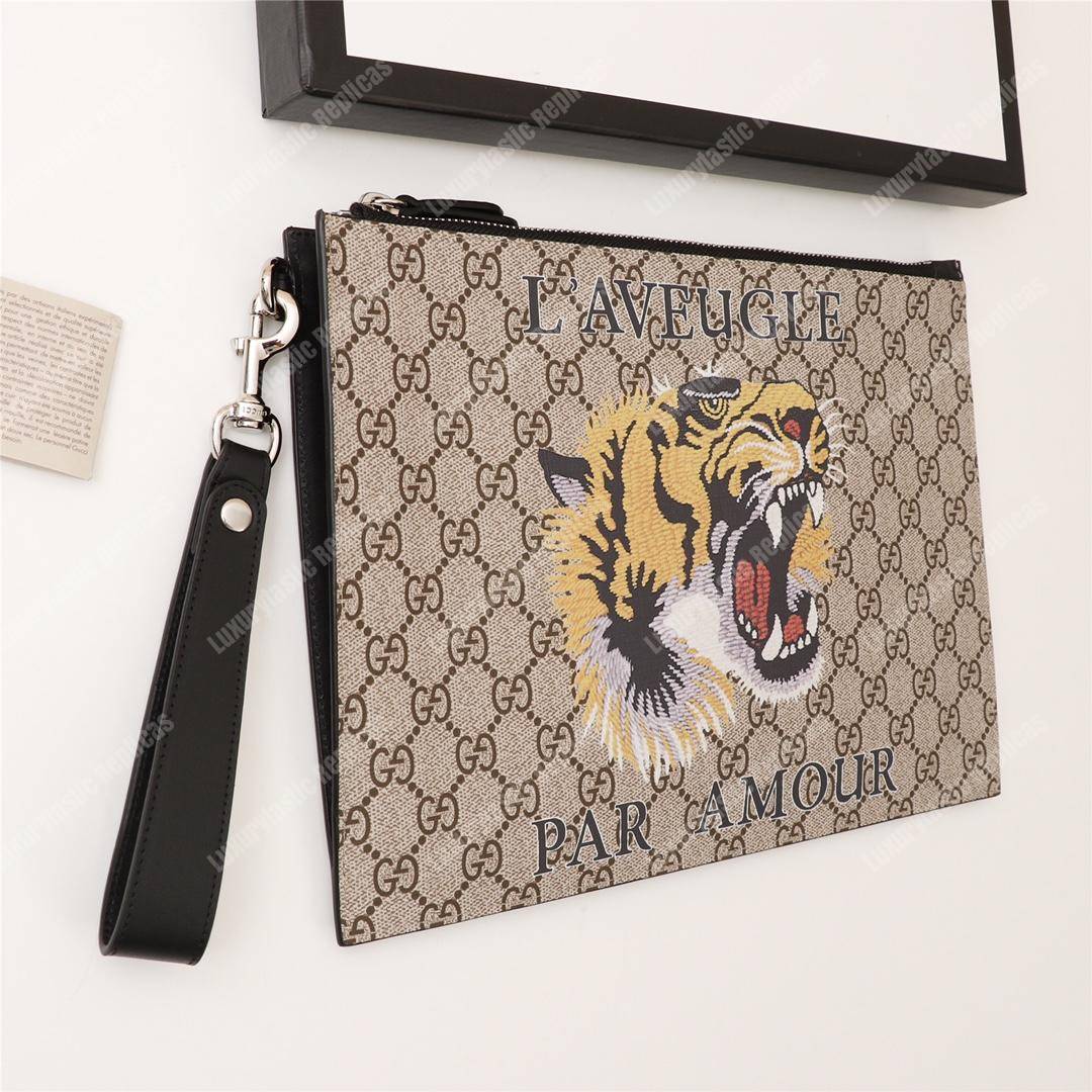 G*u*i tiger print gg sup*e clutch pouch