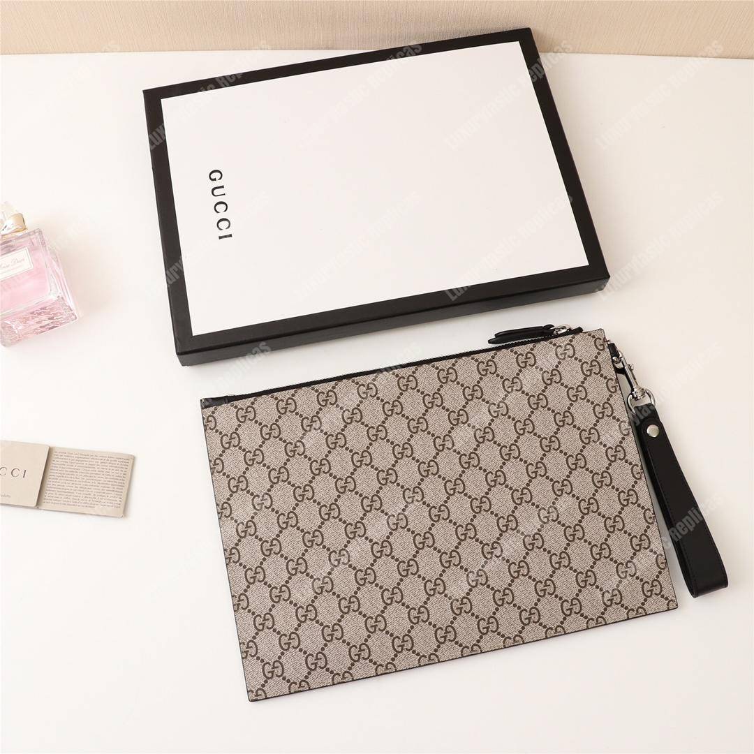 G*u*i tiger print gg sup*e clutch pouch