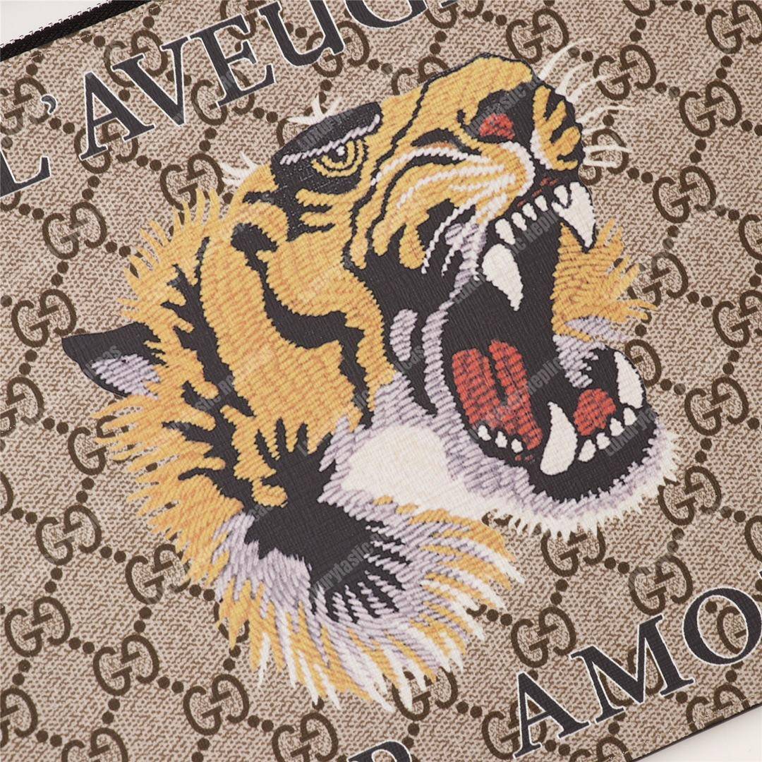 G*u*i tiger print gg sup*e clutch pouch