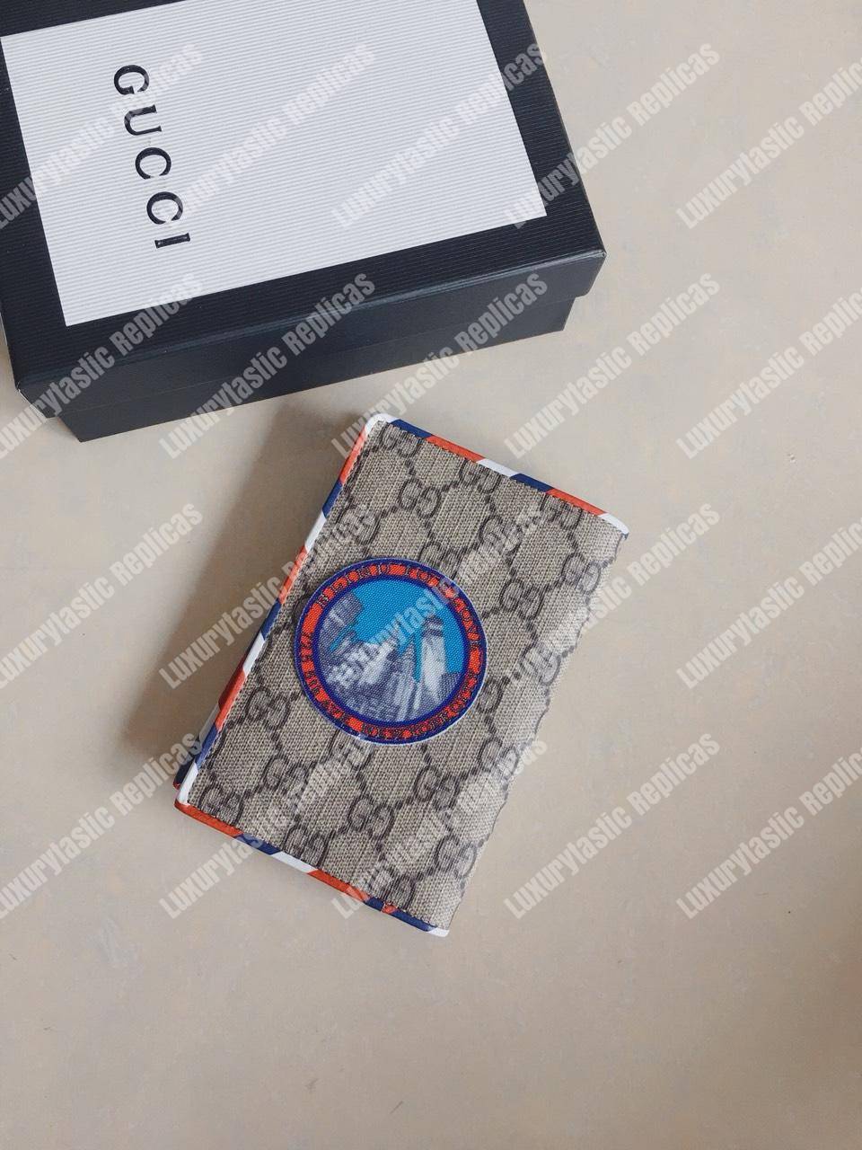 G*u*i courrier gg sup*e passport case beige ebony