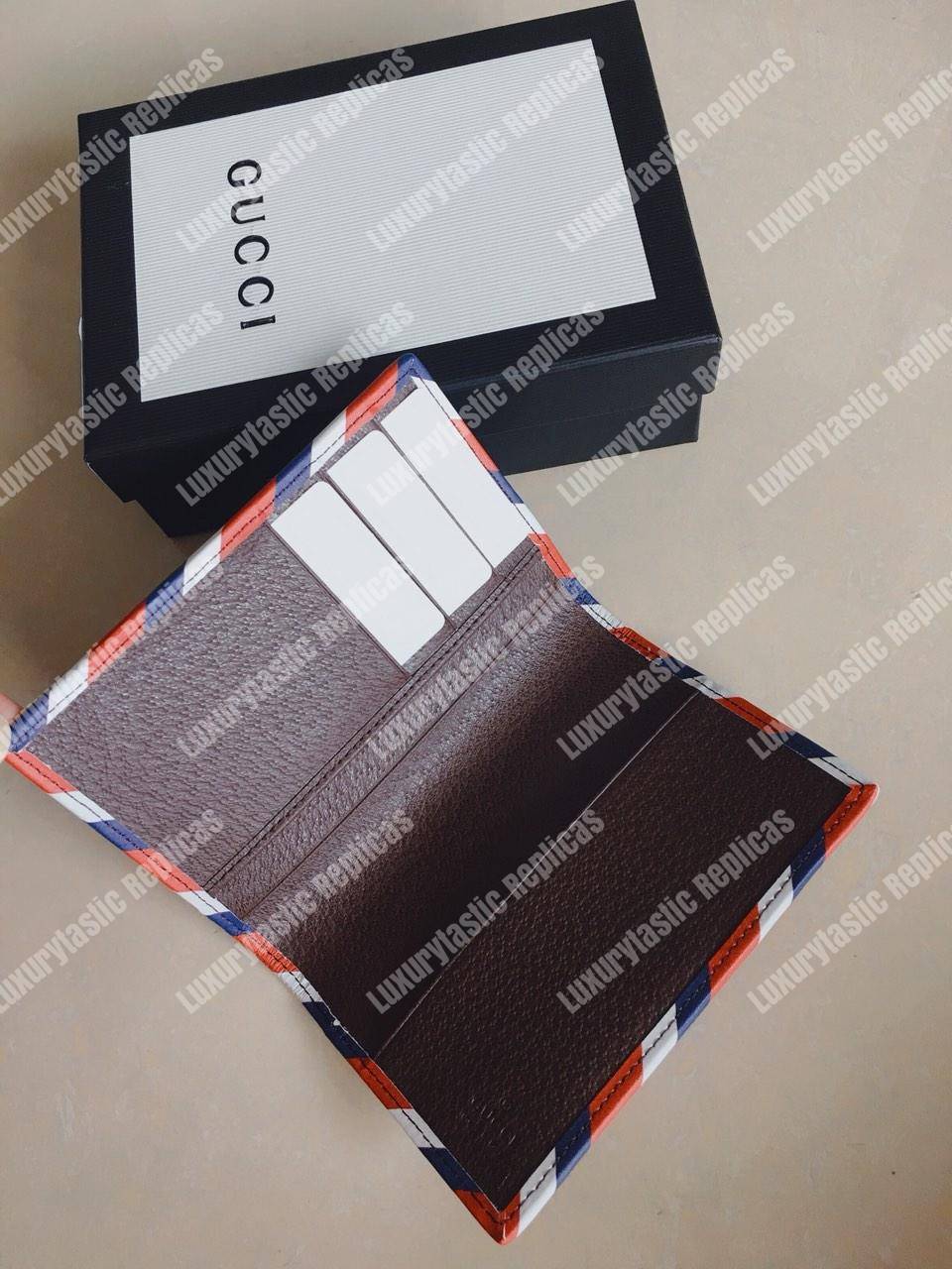 G*u*i courrier gg sup*e passport case beige ebony