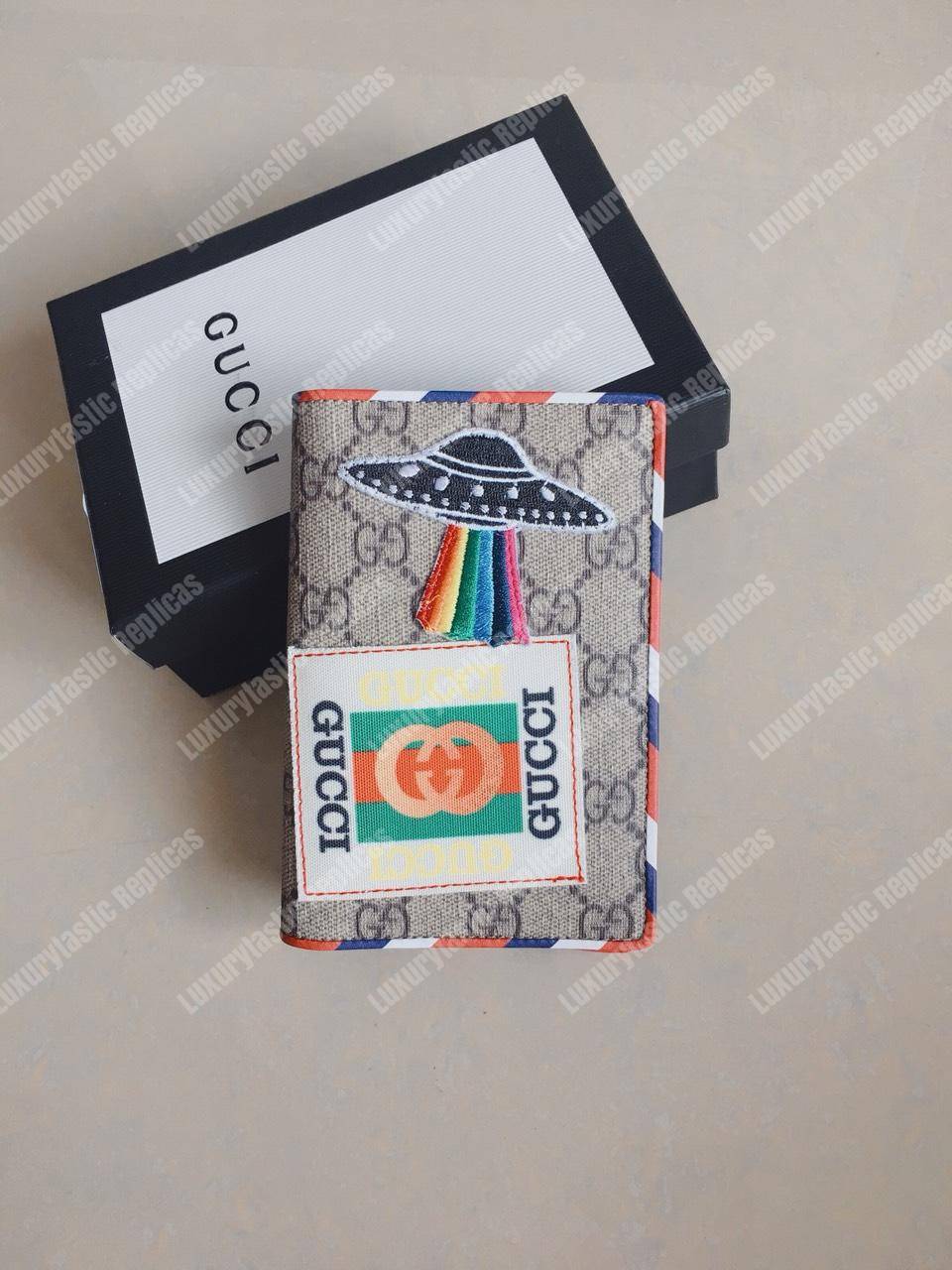 G*u*i courrier gg sup*e passport case beige ebony