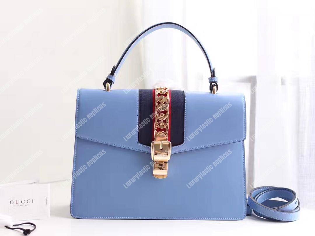G*u*i sylvie medium top handle bag light blue leather
