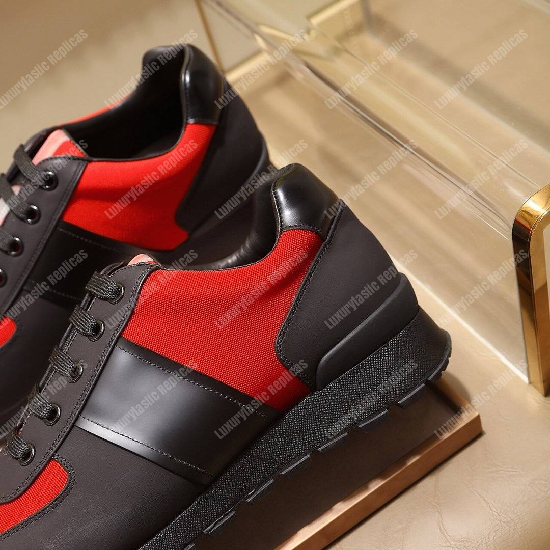 Pra*a fabric and leather sneakers red/black