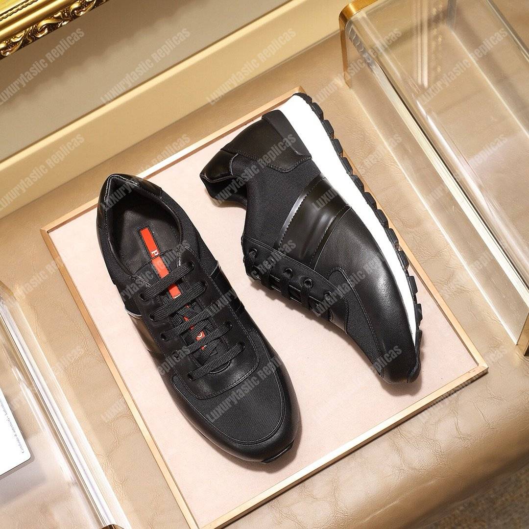 Pra*a fabric and leather sneakers black