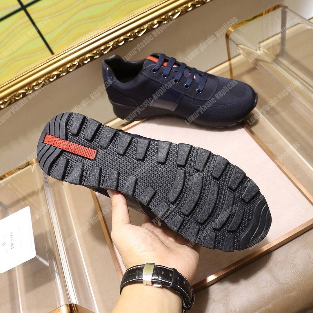 Pra*a fabric and leather sneakers dark blue