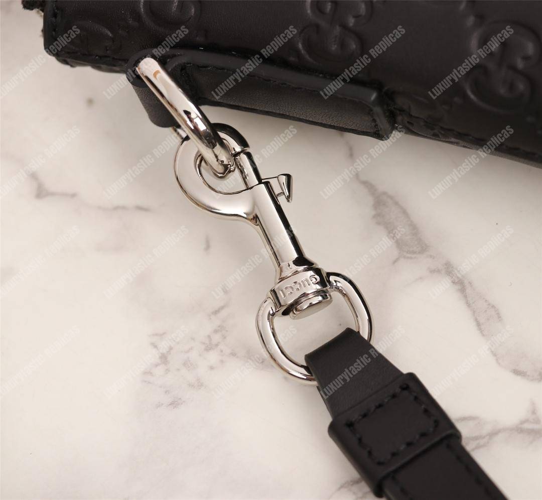 G*u*i signature leather men’s bag