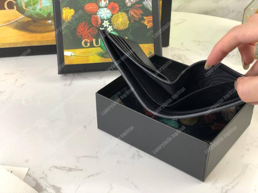 G*u*i gg marmont leather bi-fold wallet black