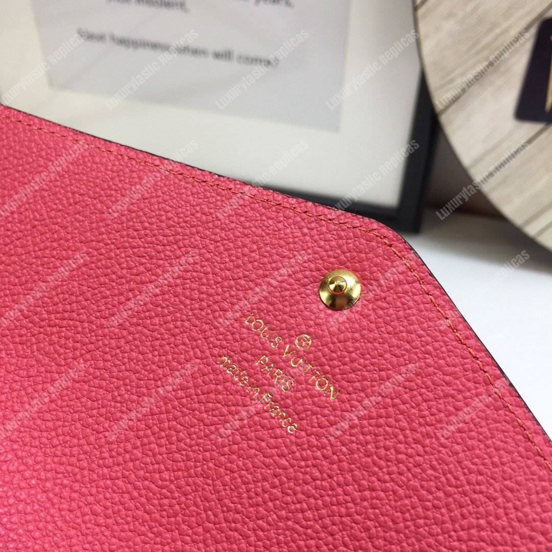 LV Sarah Wallet Monogram Empreinte Leather Scarlet