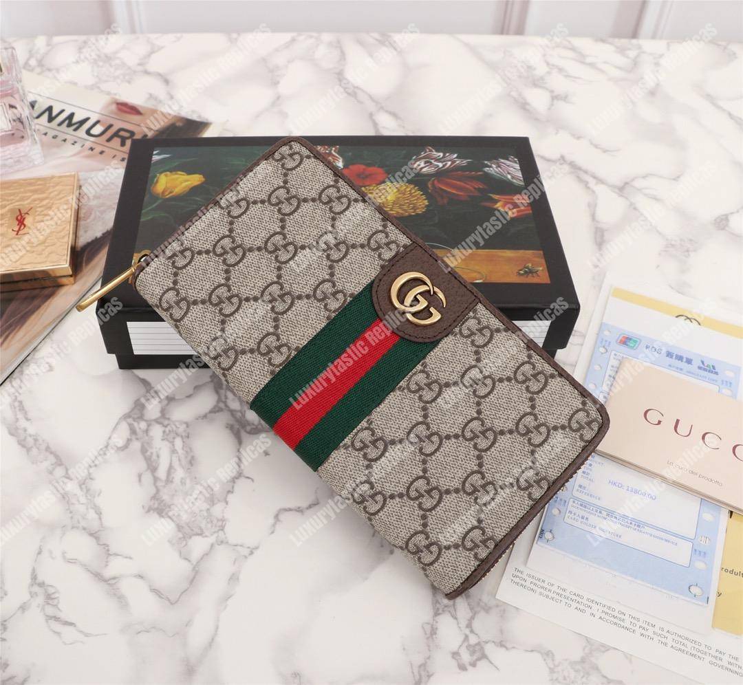 G*u*i gg zip around wallet with three little pigs