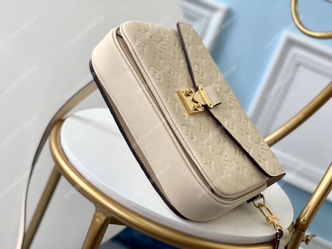 LV Pochette Metis Monogram Empreinte Leather Creme