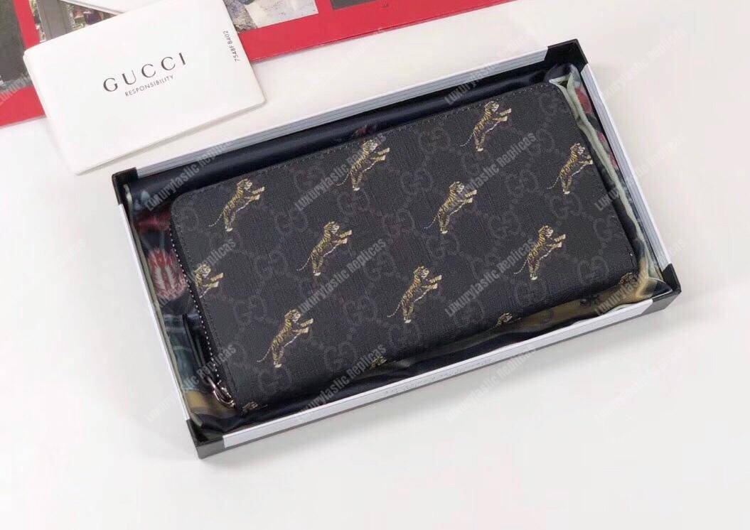 G*u*i gg zipped wallet with tiger print