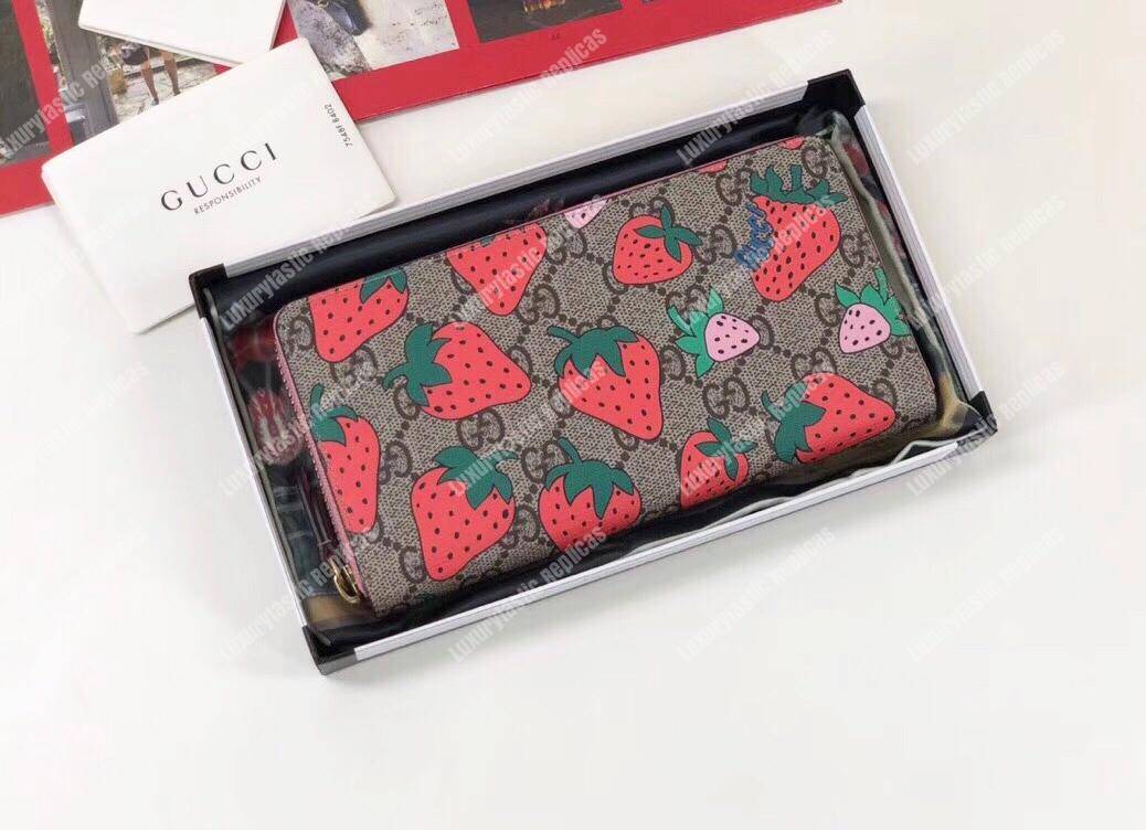G*u*i gg wallet with G*u*i strawberry print