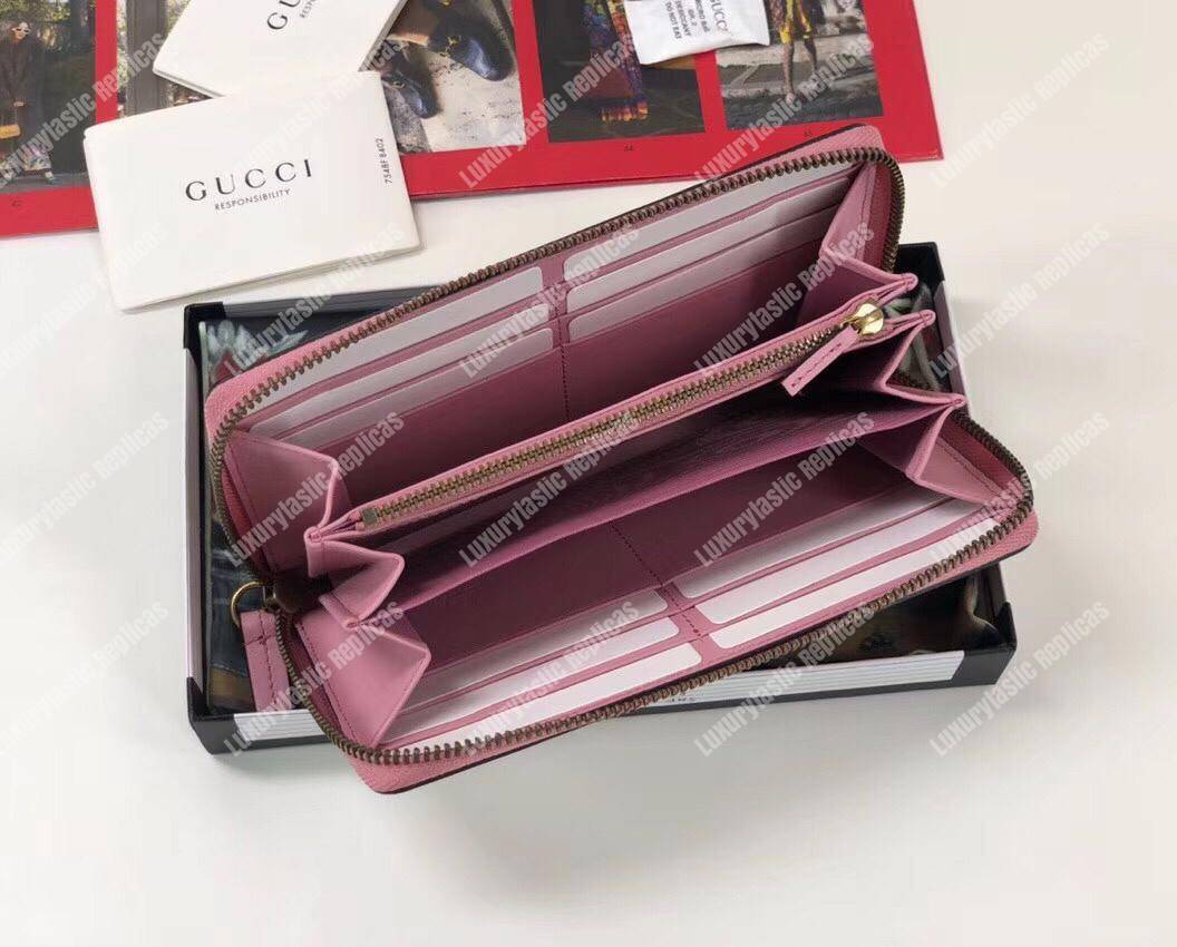 G*u*i gg wallet with G*u*i strawberry print