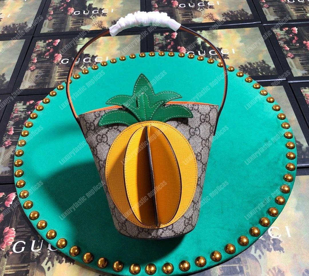 G*u*i children’s gg bucket bag with pineapple