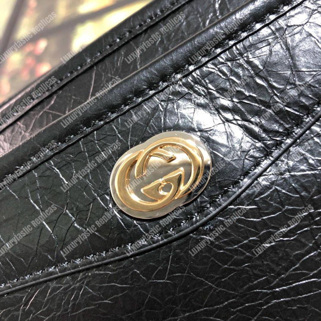 G*u*i pouch with interlocking g