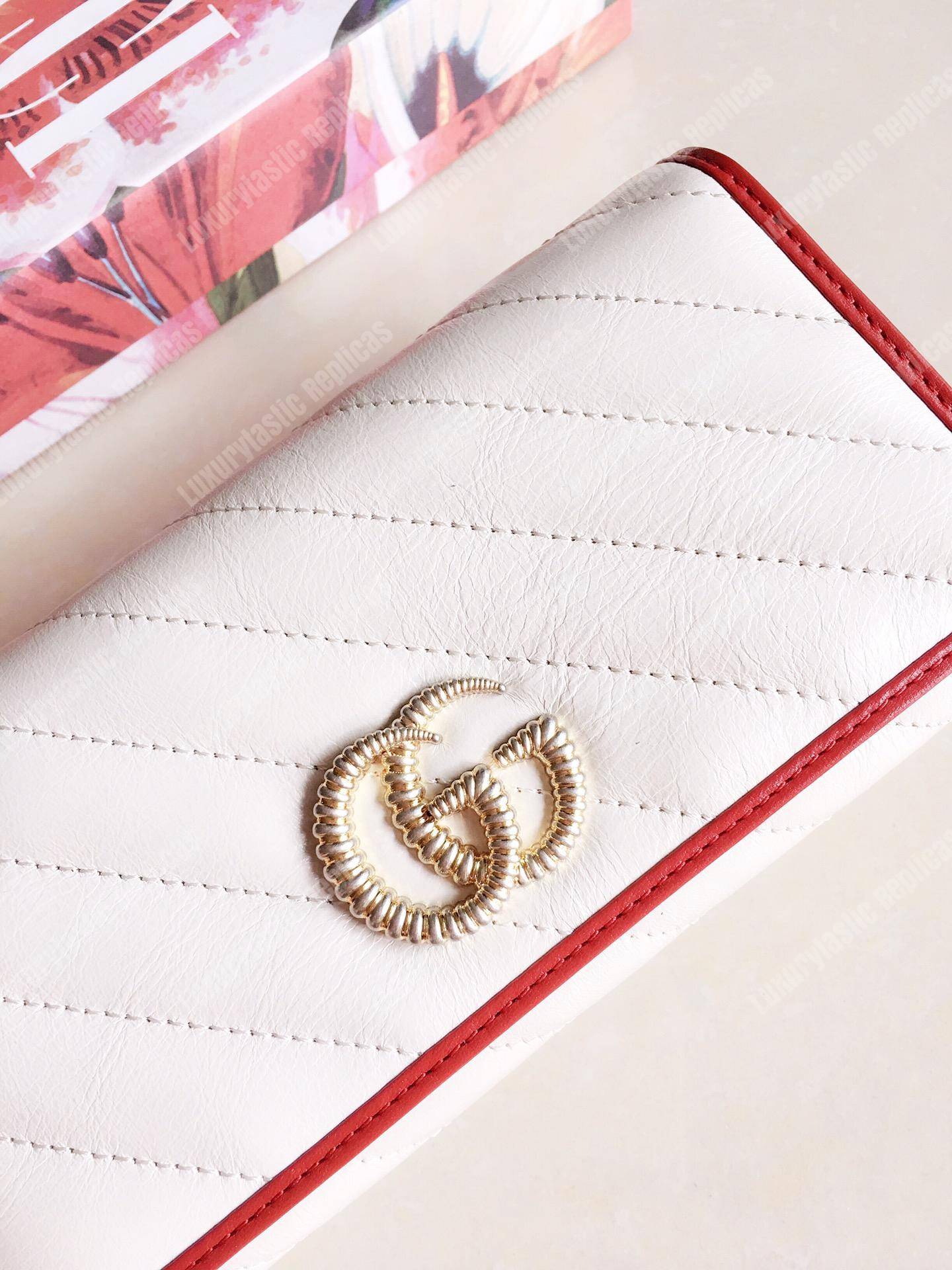 G*u*i gg twisted marmont leather continental wallet white