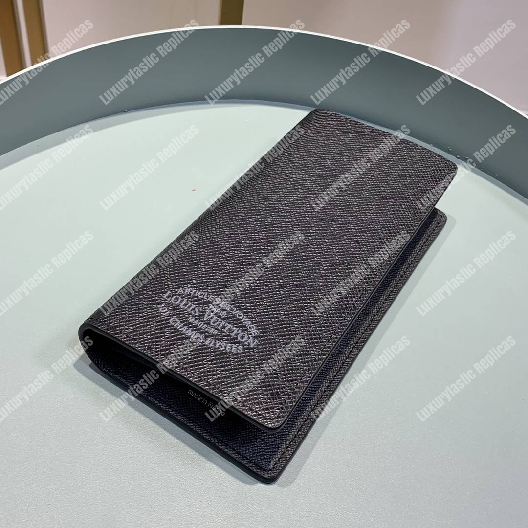lv brazza taiga articles de voyage l**is V*t*n malletier wallet bleu marine