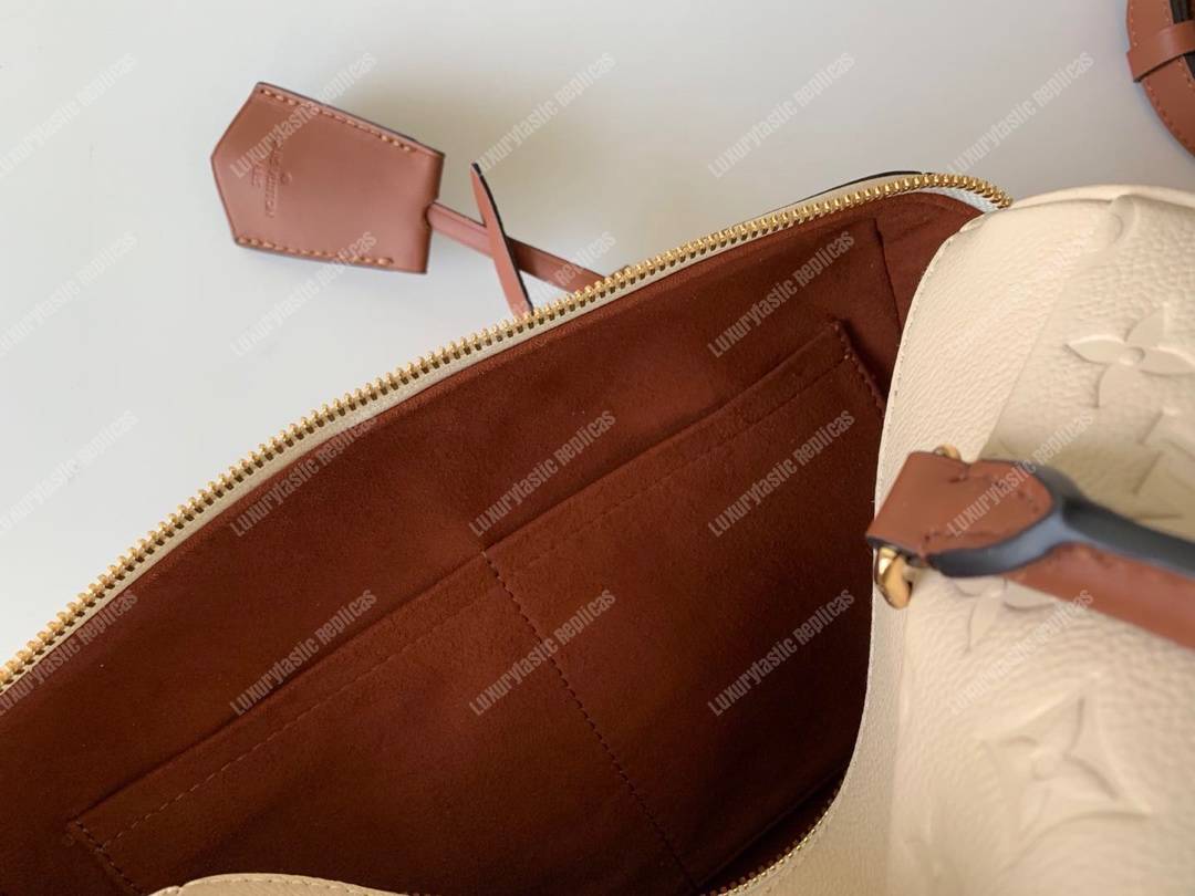 LV Speedy Bandouliere 25 Monogram Empreinte Leather Creme Caramel