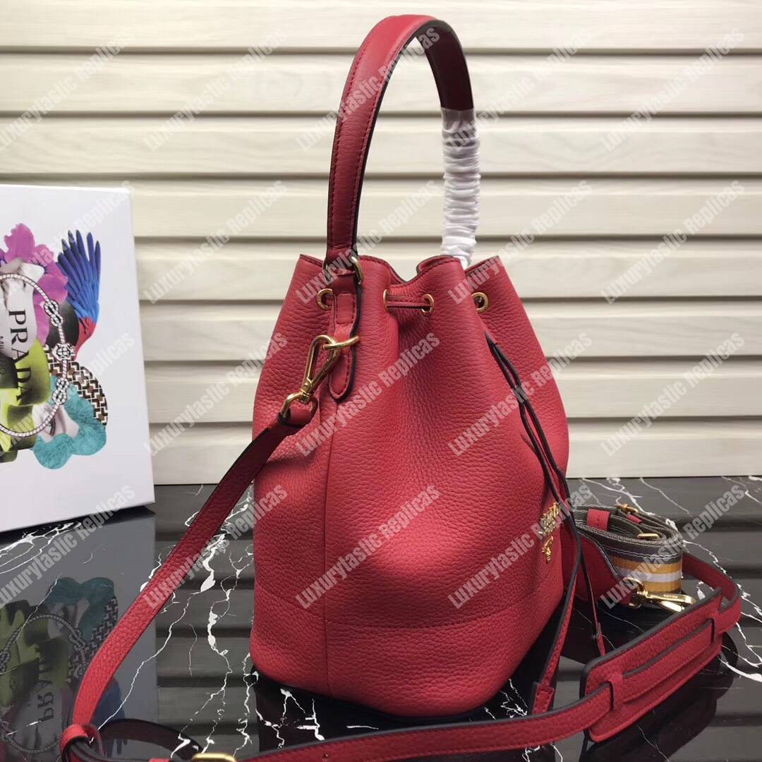 Pra*a leather bucket bag red