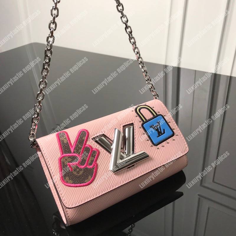 LV Twist Chain Wallet Epi Leather Travel and Trunk-Making Heritage Pink
