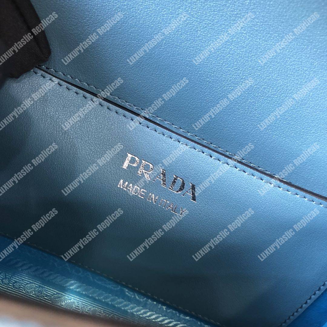 pra*a monoCh*0me saffiano leather bag light blue