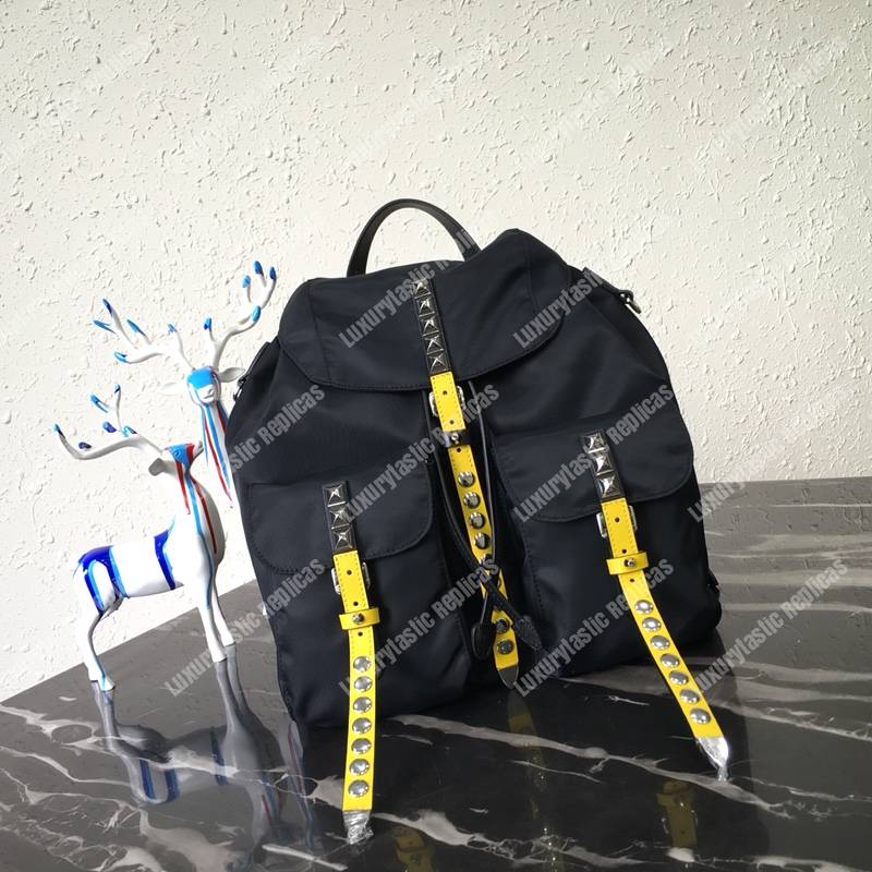 Pra*a black nylon backpack yellow