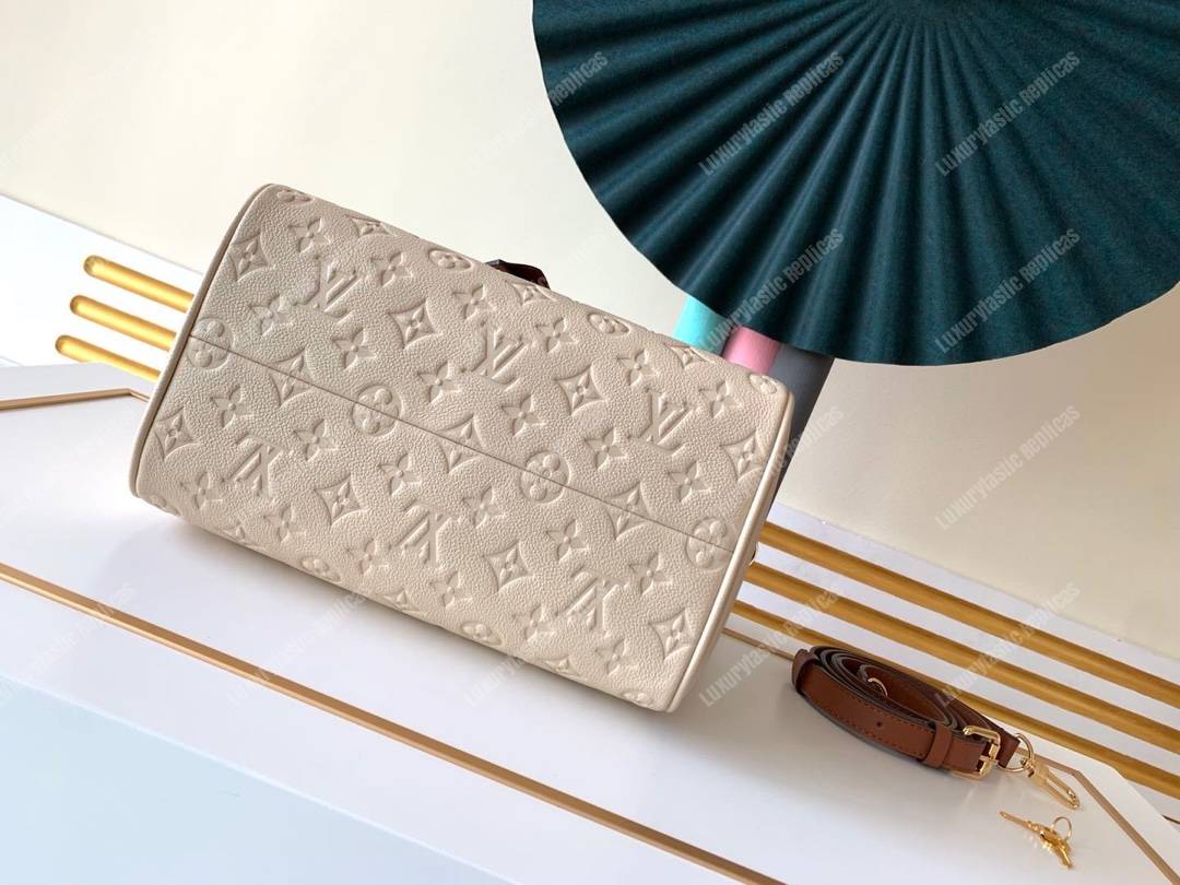 LV Speedy Bandouliere 25 Monogram Empreinte Leather Creme Caramel