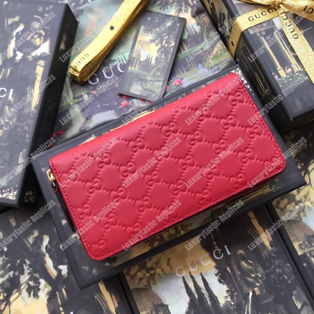 G*u*i signature zip around leather wallet red