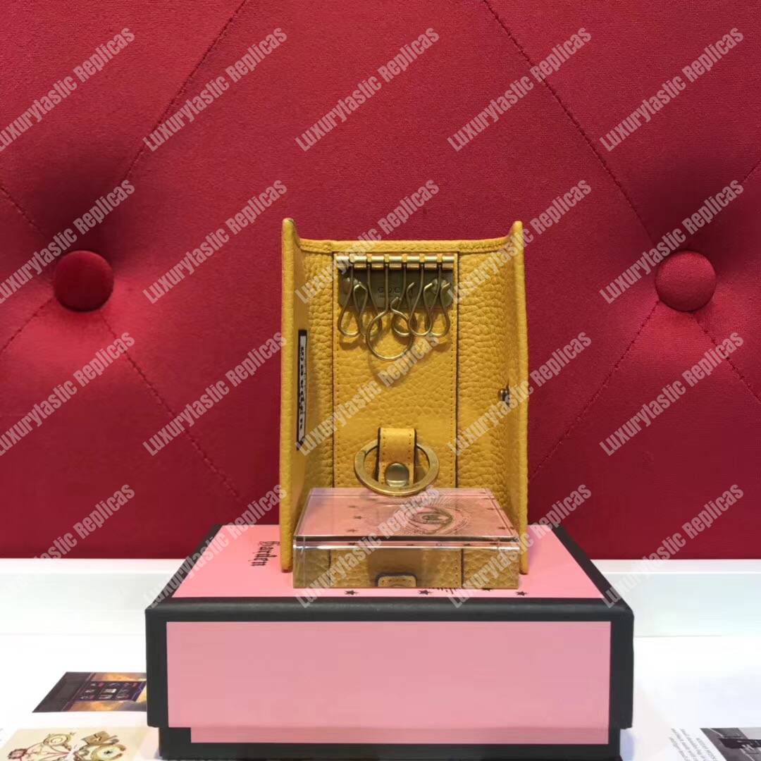 G*u*i garden leather key case yellow with bat