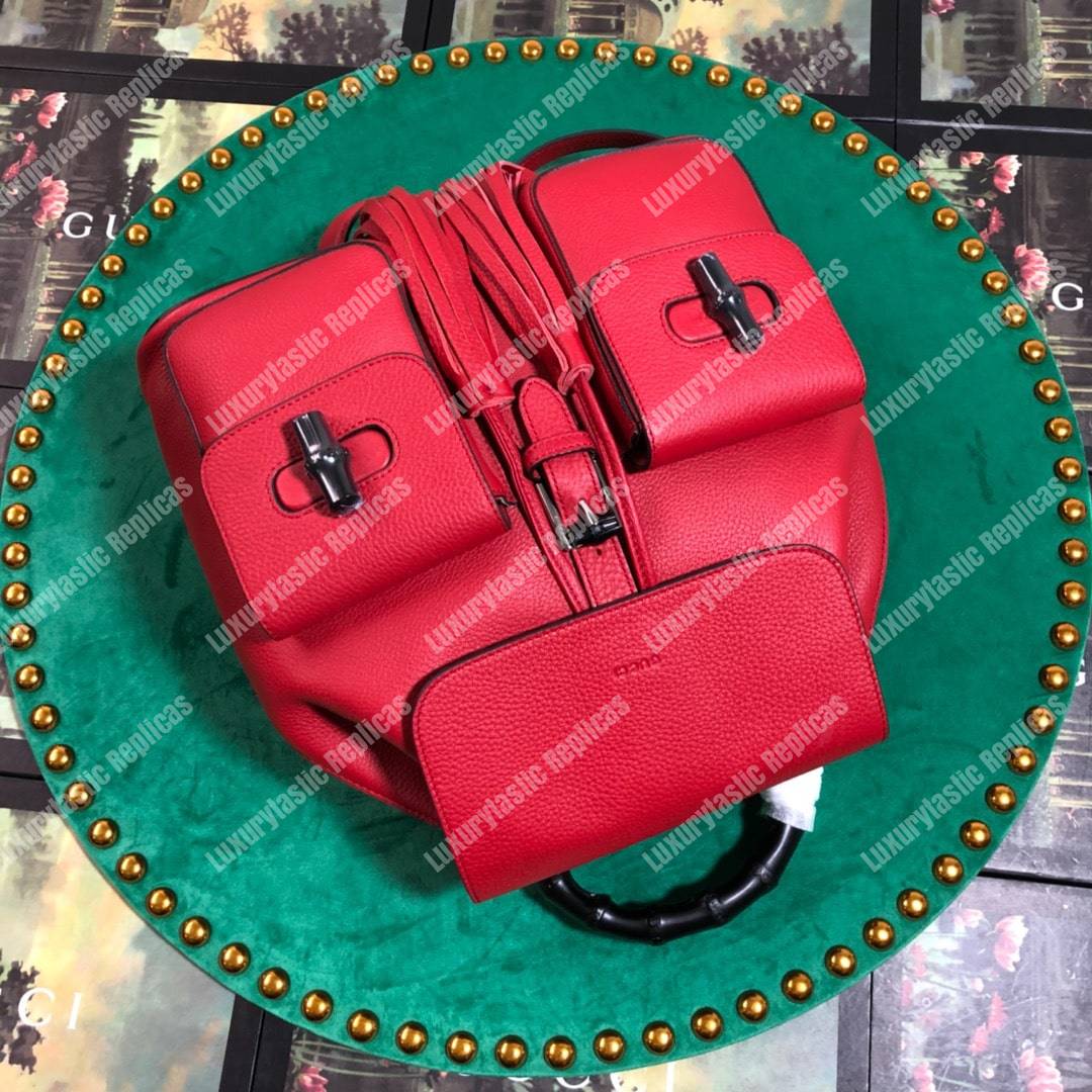 G*u*i leather bamboo tassel backpack hibiscus red