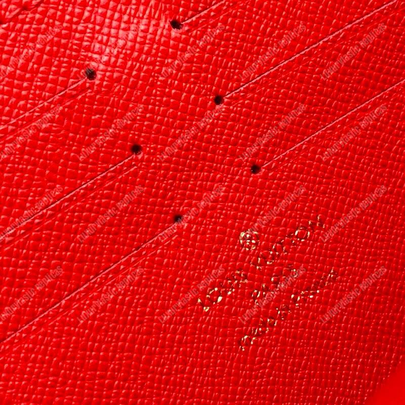 LV Alpha Clutch Monogram Satellite