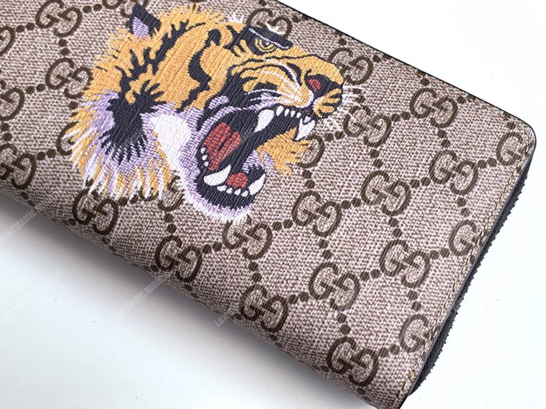 G*u*i tiger print gg sup*e zip around wallet beige/ebony