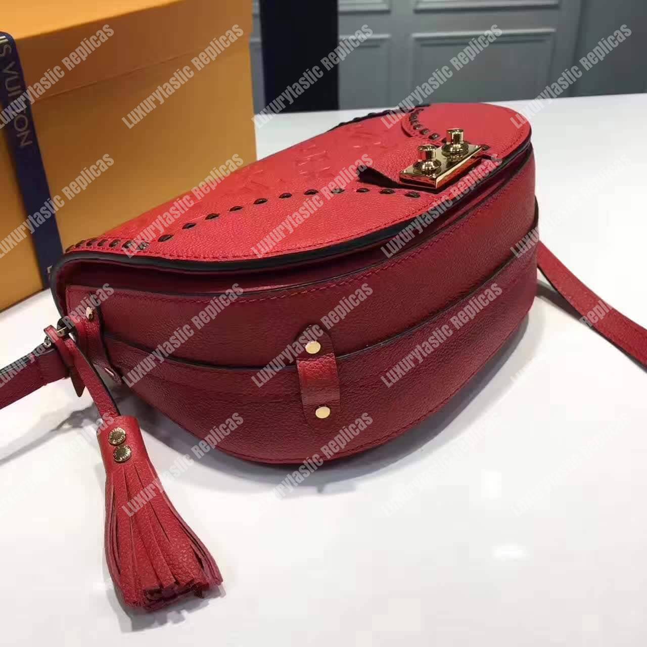 LV Junot Monogram Empreinte Leather Cerise