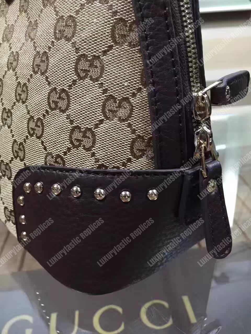 G*u*i gg canvas top handle bag black
