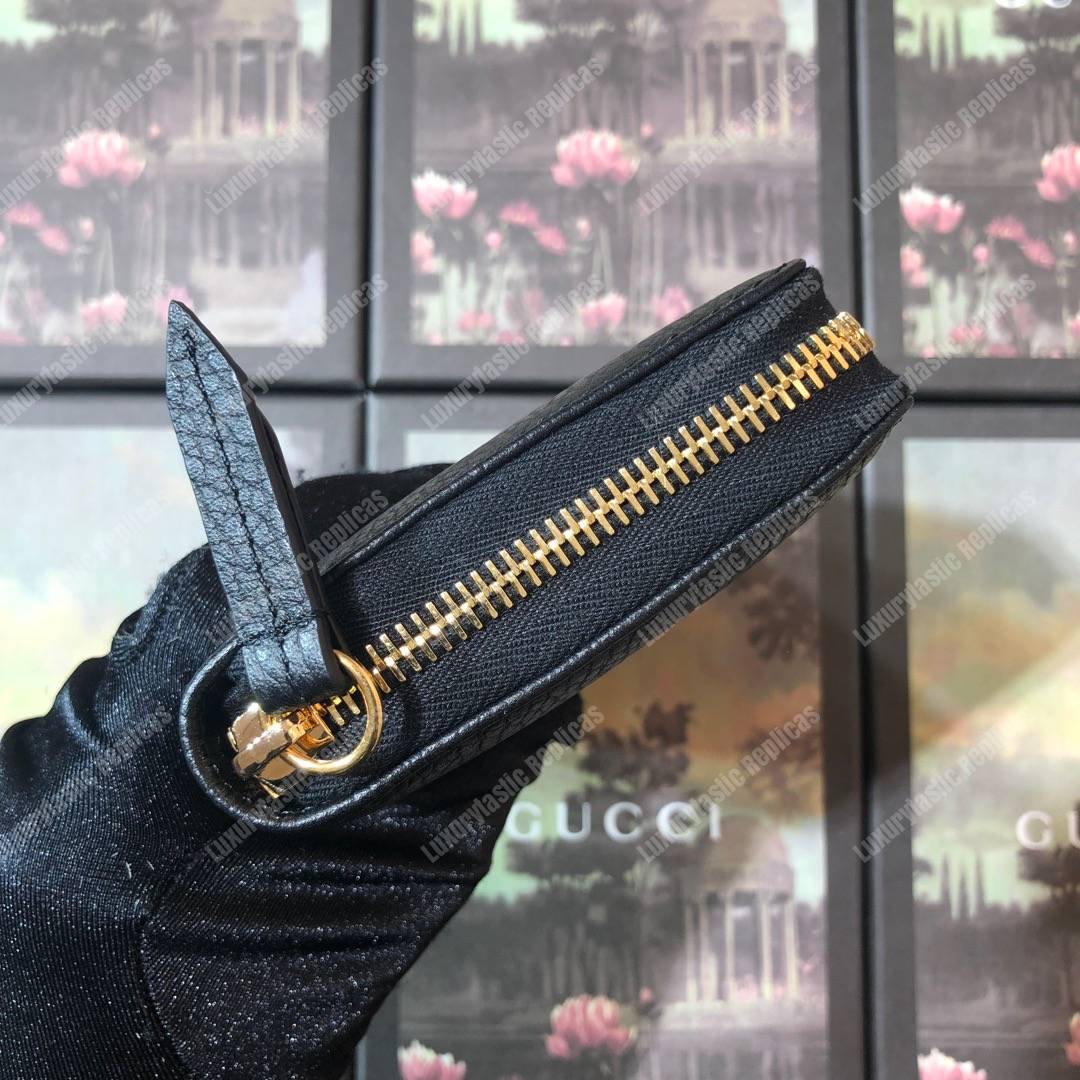 G*u*i leather zip around wallet black
