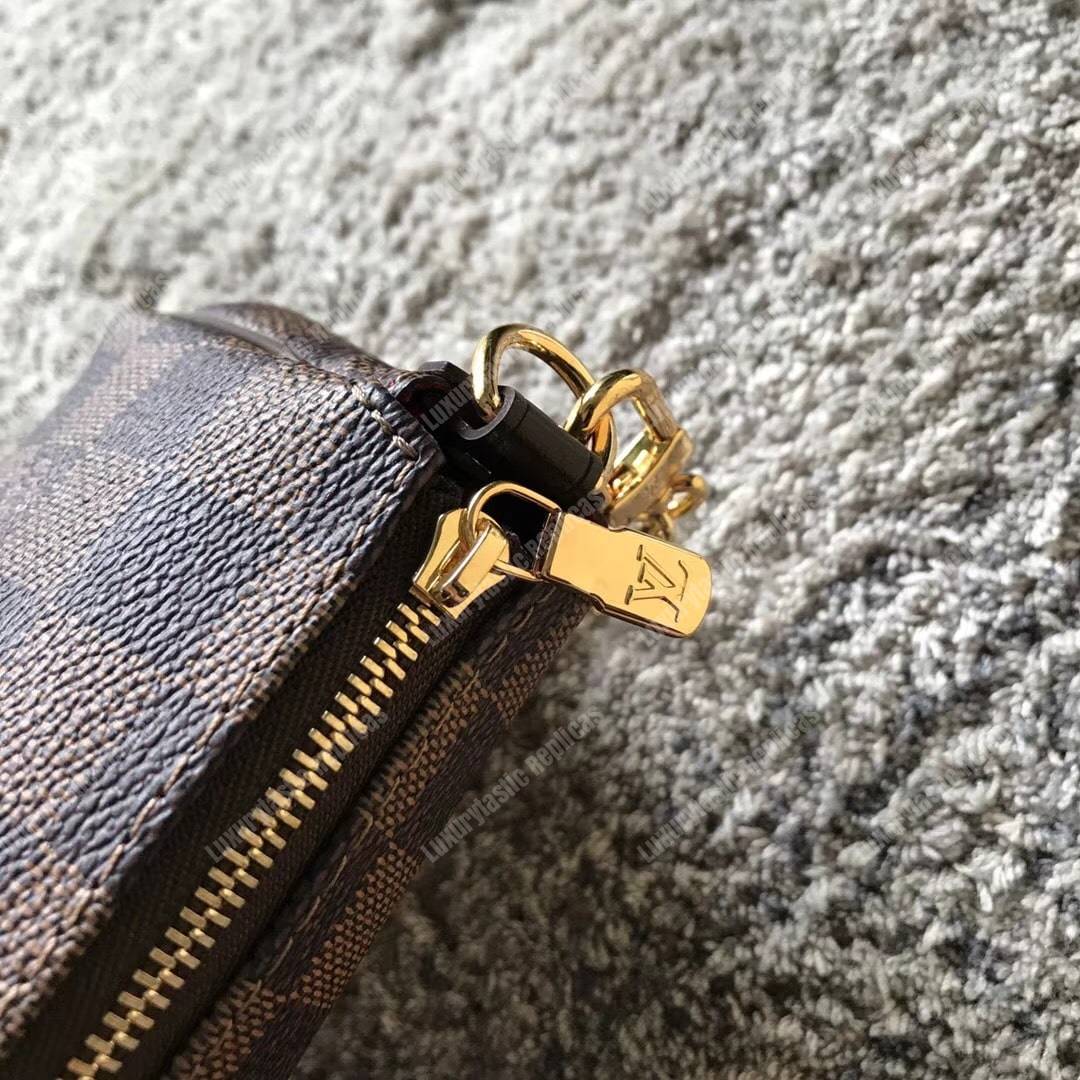 LV Eva Clutch Damier Ebene Canvas