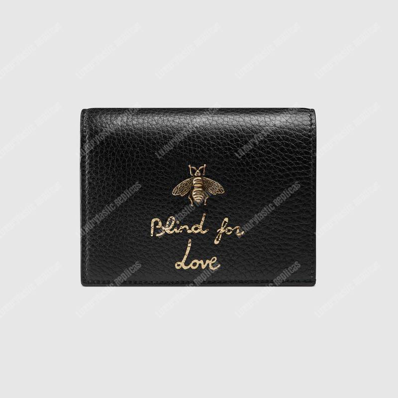 G*u*i animalier card case black with bee