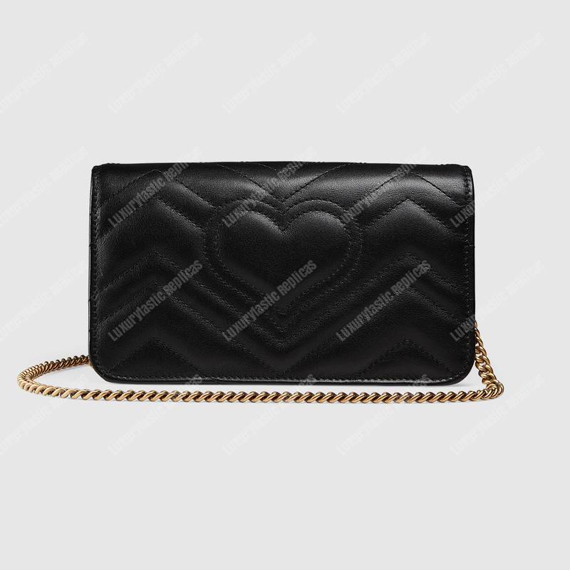 G*u*i gg marmont animal studs mini bag black