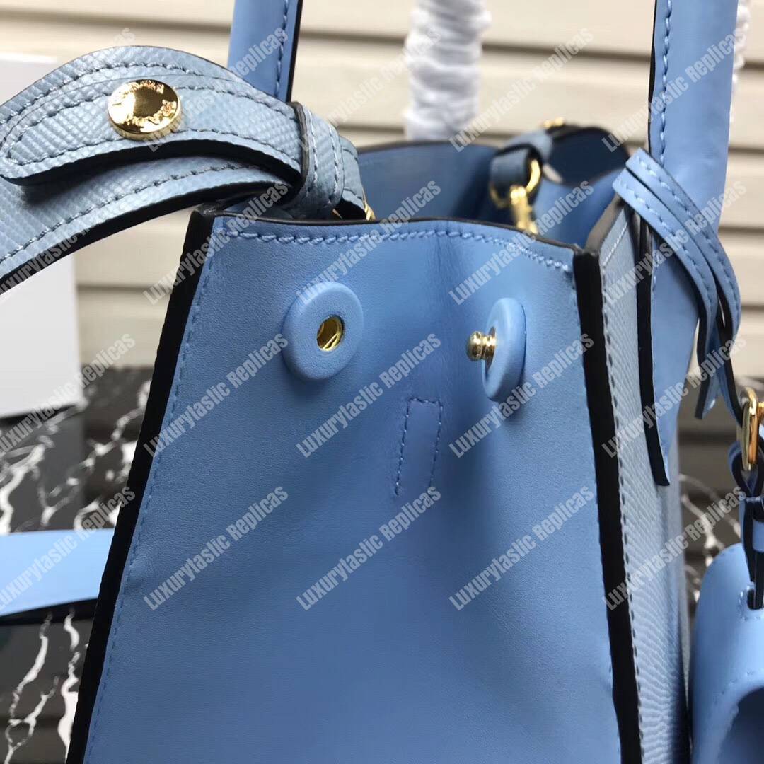pra*a monoCh*0me saffiano leather bag light blue