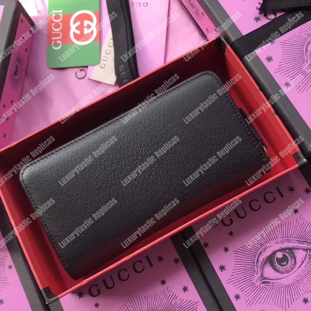 G*u*i leather zip around wallet black
