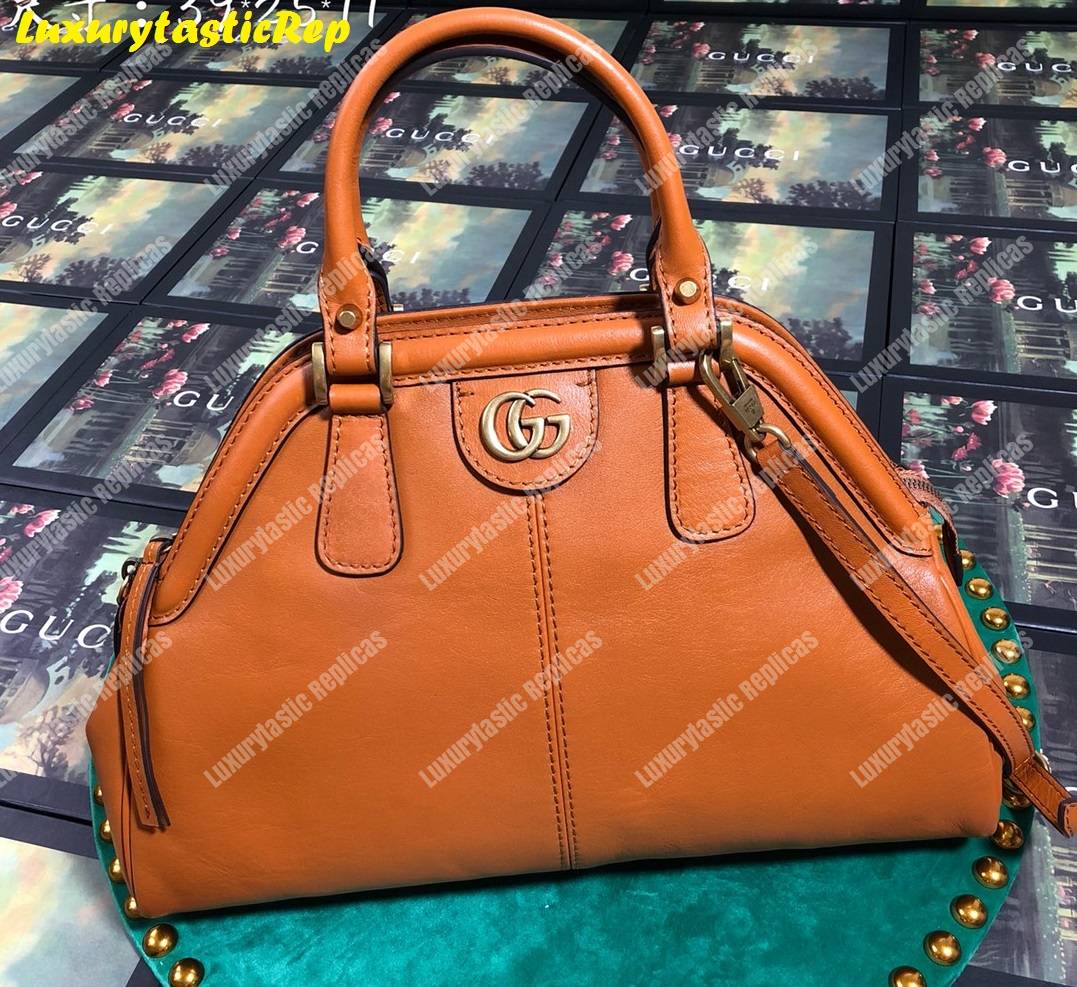 G*u*i re(belle) medium shoulder bag leather orange